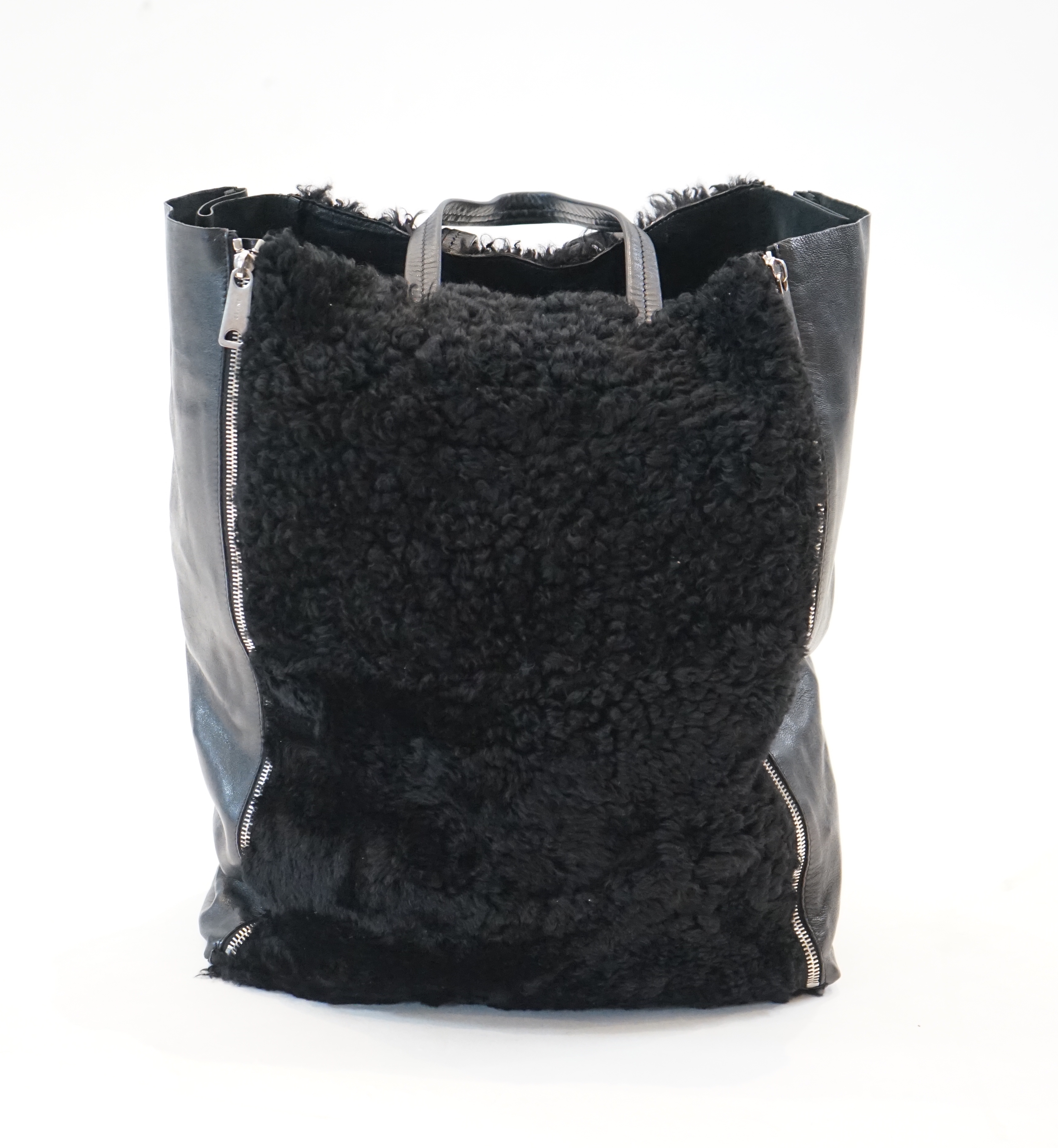 A Celine black shearling and black leather Vertical Gusset Cabas tote bag, Bag width 13cm, length 32cm, height 41cm